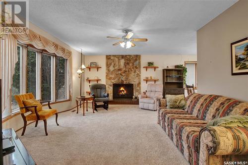 2405 Haultain Avenue, Saskatoon, SK - Indoor Photo Showing Living Room With Fireplace