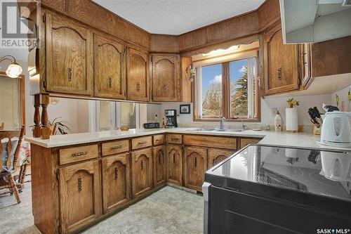 2405 Haultain Avenue, Saskatoon, SK - Indoor Photo Showing Kitchen With Double Sink