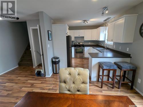 105 Haichert Street, Warman, SK - Indoor Photo Showing Kitchen With Double Sink