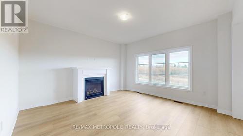 135 Flood Avenue, Clarington, ON - Indoor Photo Showing Living Room With Fireplace