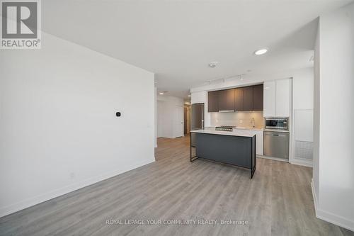 A1207 - 30 Upper Mall Way, Vaughan, ON - Indoor Photo Showing Kitchen