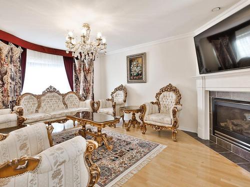 Salon - 1172 Rue Du Phare, Laval (Fabreville), QC - Indoor Photo Showing Living Room With Fireplace