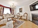 Salon - 1172 Rue Du Phare, Laval (Fabreville), QC  - Indoor Photo Showing Living Room With Fireplace 