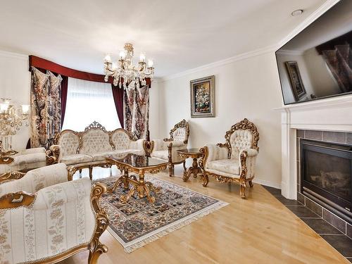 Salon - 1172 Rue Du Phare, Laval (Fabreville), QC - Indoor Photo Showing Living Room With Fireplace