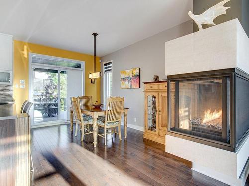 Dining room - 1137 Rue Pierre-Mercure, Boucherville, QC - Indoor Photo Showing Dining Room With Fireplace