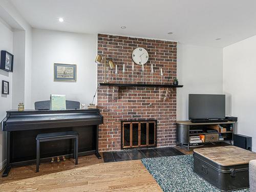 Family room - 276 Rue Des Landes, Saint-Lambert, QC - Indoor Photo Showing Living Room With Fireplace