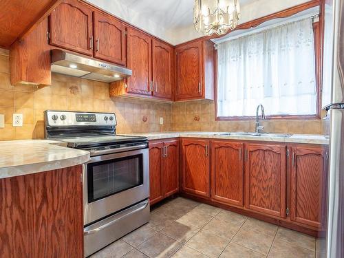 Cuisine - 8022  - 8026 Boul. Perras, Montréal (Rivière-Des-Prairies/Pointe-Aux-Trembles), QC - Indoor Photo Showing Kitchen With Double Sink