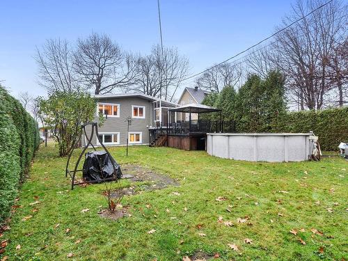 Face arriÃ¨re - 1393 Rue Louis-Francoeur, Québec (Sainte-Foy/Sillery/Cap-Rouge), QC - Outdoor With Above Ground Pool With Backyard