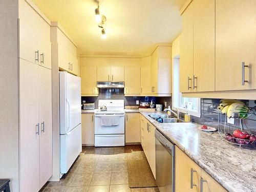 Kitchen - 1499  - 1501 Av. Rawlinson, Mascouche, QC - Indoor Photo Showing Kitchen With Double Sink