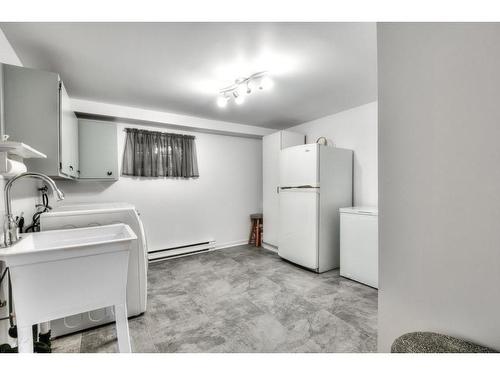 Laundry room - 4050 Av. Maupassant, Brossard, QC - Indoor Photo Showing Laundry Room