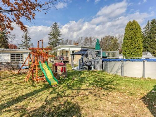 Backyard - 460 204E Rue, Shawinigan, QC - Outdoor With Above Ground Pool