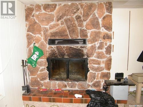 12 John East Avenue, Saskatoon, SK - Indoor Photo Showing Living Room With Fireplace