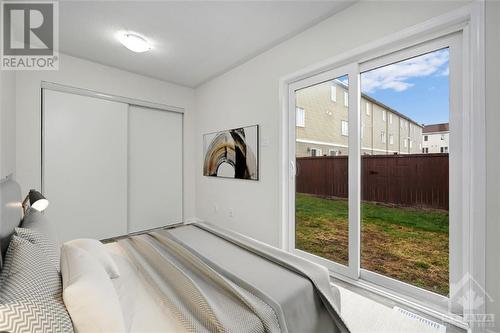 Virtually Staged - 413 Sadar Private, Ottawa, ON - Indoor Photo Showing Bedroom