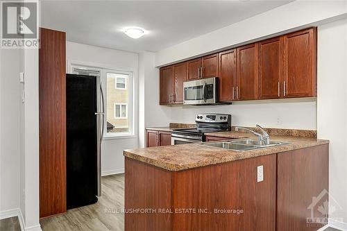 413 Sadar, Ottawa, ON - Indoor Photo Showing Kitchen With Double Sink