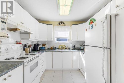 1505 Clement Street Unit#108, Hawkesbury, ON - Indoor Photo Showing Kitchen With Double Sink