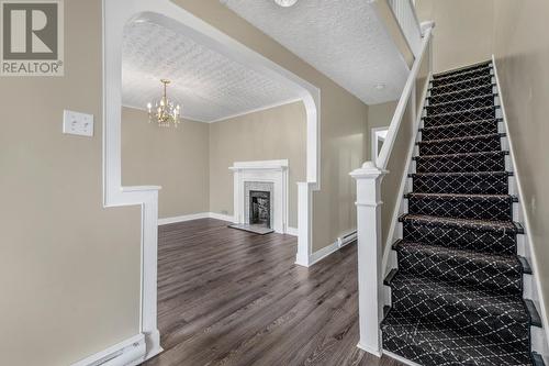 100 Merrymeeting Road, St Johns, NL - Indoor Photo Showing Other Room With Fireplace