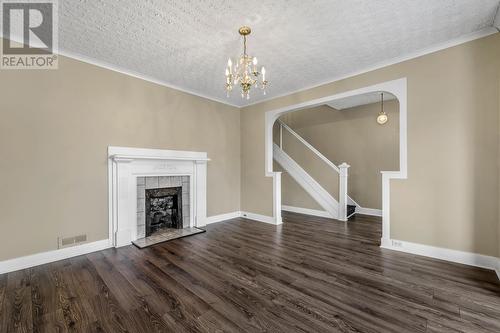 100 Merrymeeting Road, St Johns, NL - Indoor Photo Showing Other Room With Fireplace