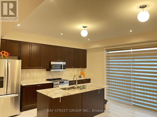 251 Tennant Circle, Vaughan, ON - Indoor Photo Showing Kitchen With Double Sink With Upgraded Kitchen