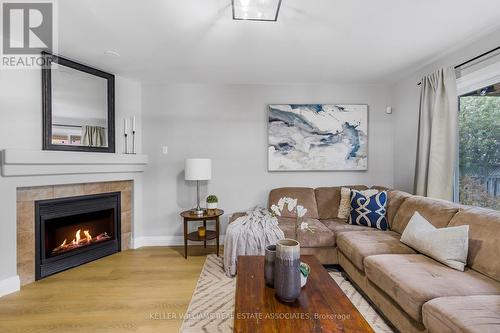 1606 Waldie Avenue, Milton, ON - Indoor Photo Showing Living Room With Fireplace