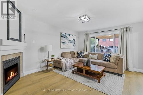 1606 Waldie Avenue, Milton, ON - Indoor Photo Showing Living Room With Fireplace