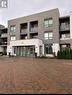 217 - 40 Via Rosedale Way, Brampton, ON  - Outdoor With Balcony With Facade 