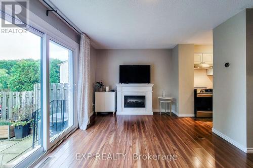 2 - 1300 Upper Ottawa Street, Hamilton, ON - Indoor Photo Showing Living Room With Fireplace