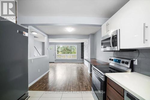 22 - 120 Quigley Road, Hamilton, ON - Indoor Photo Showing Kitchen