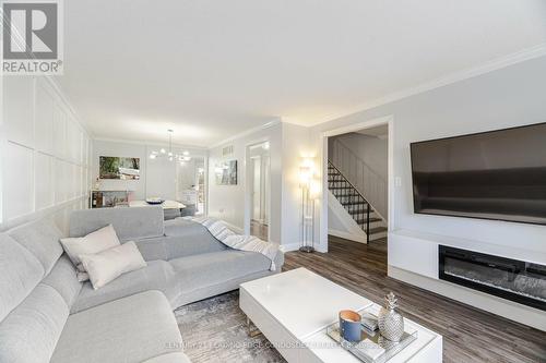 35 Heaslip Terrace, Toronto, ON - Indoor Photo Showing Living Room With Fireplace