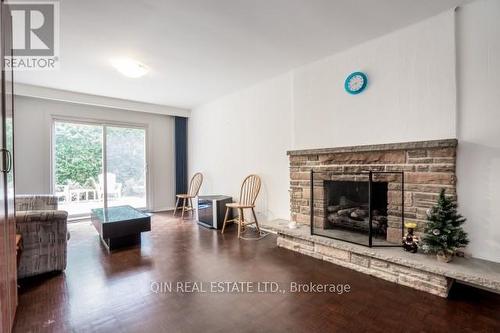 22 St Andres Court, Markham, ON - Indoor Photo Showing Living Room With Fireplace