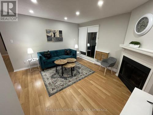 613 - 1512 Pilgrims Way, Oakville, ON - Indoor Photo Showing Living Room With Fireplace