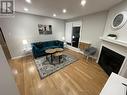 613 - 1512 Pilgrims Way, Oakville, ON  - Indoor Photo Showing Living Room With Fireplace 