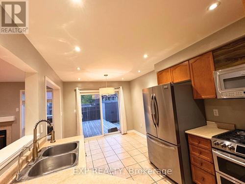 #Upper - 718 Irving Terrace, Milton, ON - Indoor Photo Showing Kitchen With Double Sink