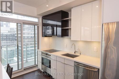 1208 - 33 Shore Breeze Drive, Toronto, ON - Indoor Photo Showing Kitchen With Upgraded Kitchen