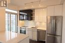 1208 - 33 Shore Breeze Drive, Toronto, ON  - Indoor Photo Showing Kitchen With Upgraded Kitchen 