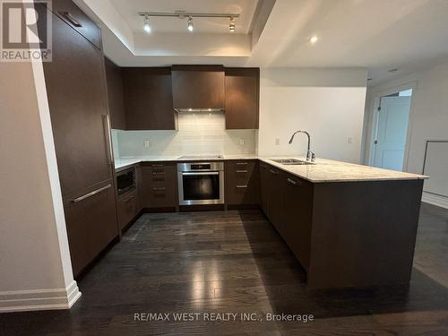 411 - 30 Old Mill Road, Toronto, ON - Indoor Photo Showing Kitchen With Double Sink With Upgraded Kitchen