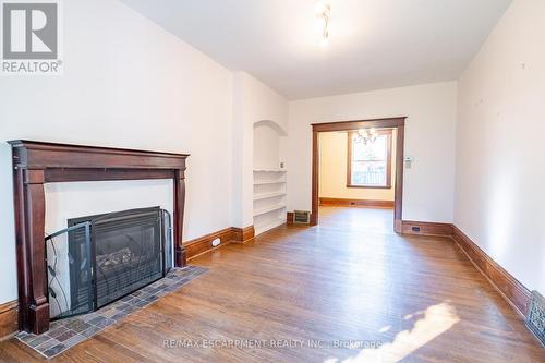 26 Ontario Avenue, Hamilton, ON - Indoor Photo Showing Living Room With Fireplace