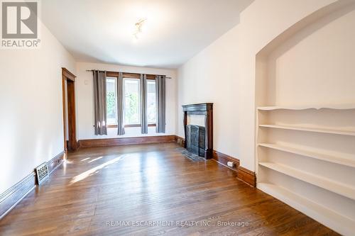 26 Ontario Avenue, Hamilton, ON - Indoor Photo Showing Other Room With Fireplace