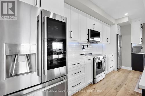 LG ThinQ Technology Appliances & Pot Filler - 908 - 330 Ridout Street N, London, ON - Indoor Photo Showing Kitchen With Upgraded Kitchen