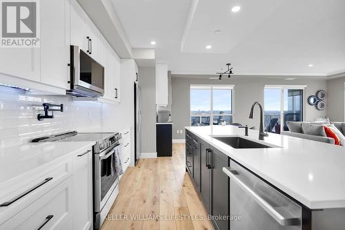 Under Mount Lighting - 908 - 330 Ridout Street N, London, ON - Indoor Photo Showing Kitchen With Upgraded Kitchen