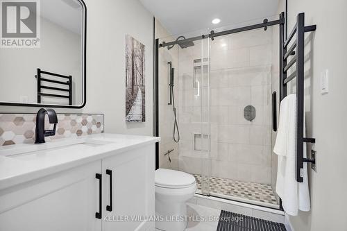 Rain Shower Head & Heated Towel Rack - 908 - 330 Ridout Street N, London, ON - Indoor Photo Showing Bathroom