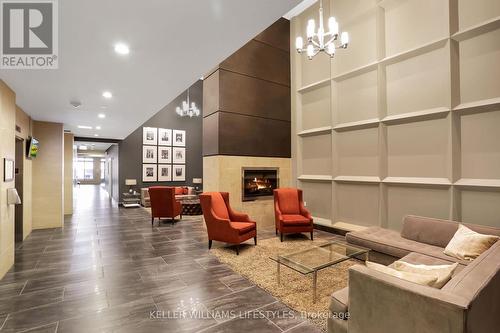 Front Lobby - 908 - 330 Ridout Street N, London, ON - Indoor Photo Showing Other Room With Fireplace