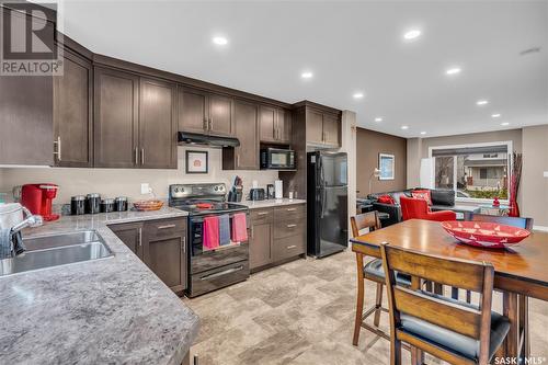 5125 Jim Cairns Boulevard, Regina, SK - Indoor Photo Showing Kitchen With Double Sink