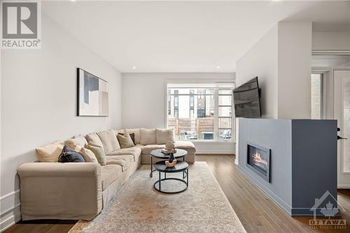 977 Ralph Hennessy Avenue, Ottawa, ON - Indoor Photo Showing Living Room With Fireplace