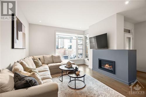 977 Ralph Hennessy Avenue, Ottawa, ON - Indoor Photo Showing Living Room With Fireplace