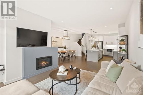 977 Ralph Hennessy Avenue, Ottawa, ON - Indoor Photo Showing Living Room With Fireplace