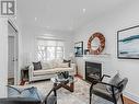 16 Taunton Road, Toronto, ON  - Indoor Photo Showing Living Room With Fireplace 