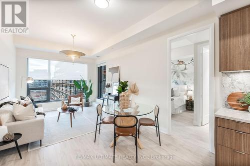 617 - 280 Howland Avenue, Toronto, ON - Indoor Photo Showing Living Room With Fireplace