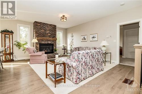 342 Pinehill Road, North Grenville, ON - Indoor Photo Showing Living Room With Fireplace