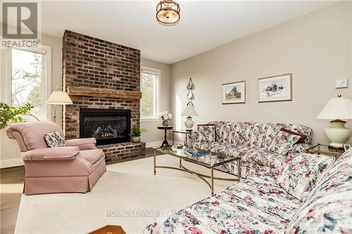 342 Pinehill Road, North Grenville, ON - Indoor Photo Showing Living Room With Fireplace