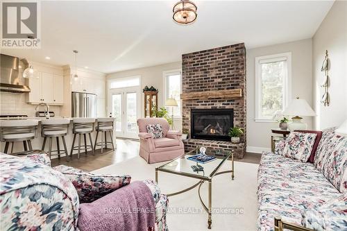 342 Pinehill Road, North Grenville, ON - Indoor Photo Showing Living Room With Fireplace